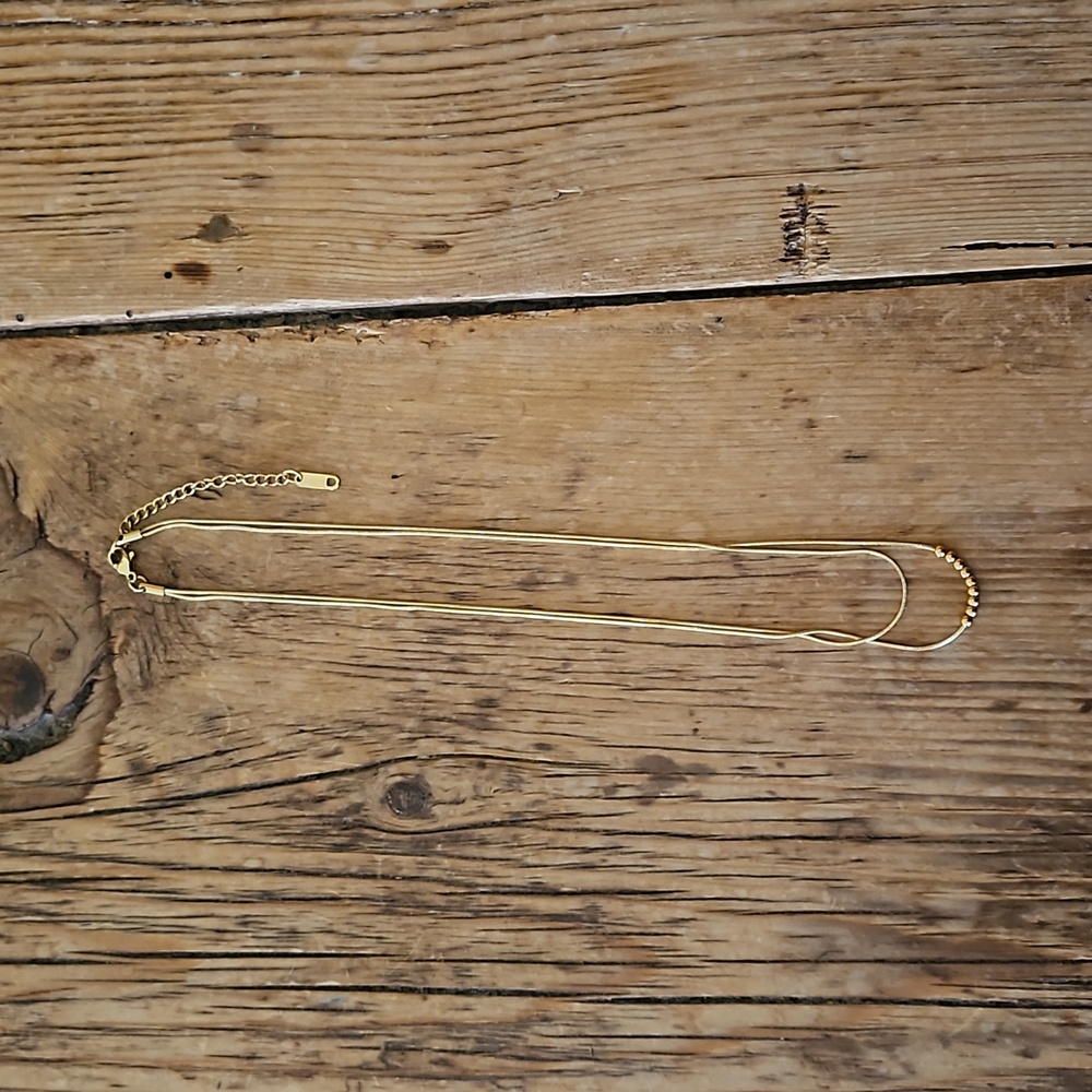 Gold necklace, $10